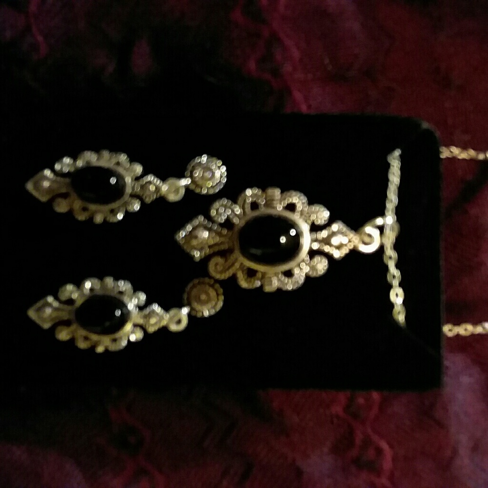 2  necklace and earring sets
